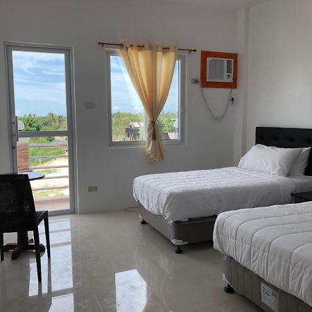 Arriyus Apartelle Daanbantayan Exterior foto