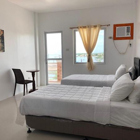 Arriyus Apartelle Daanbantayan Exterior foto