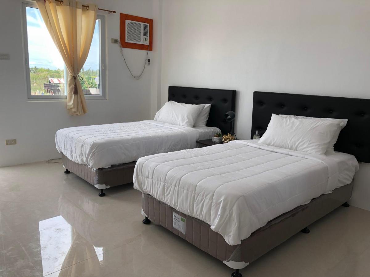 Arriyus Apartelle Daanbantayan Exterior foto