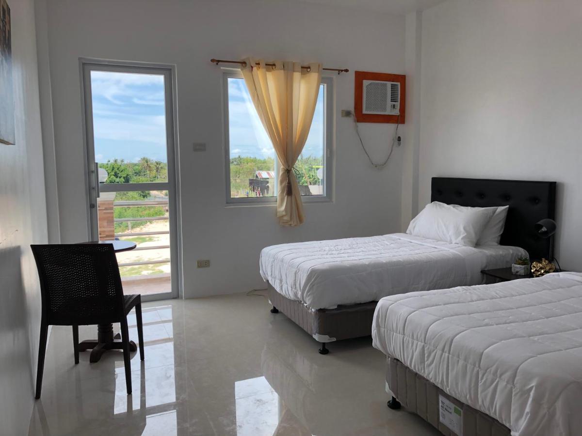 Arriyus Apartelle Daanbantayan Exterior foto